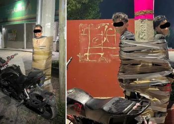 Pria Misterius Dijuluki Batman Dikejar Polisi Karena Mengikat Maling Motor di Tiang Lampu