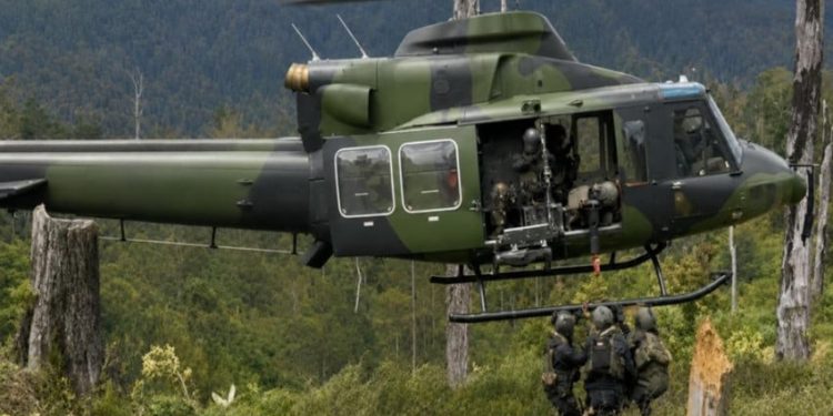 Evakuasi Warga Ugimba dari Daerah Rawan OPM Menggunakan Dua Helikopter Koops TNI Habema